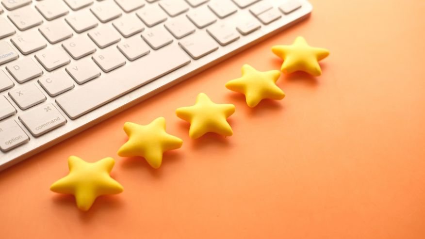 Graphic of a keyboard and five stars, representing a five star review