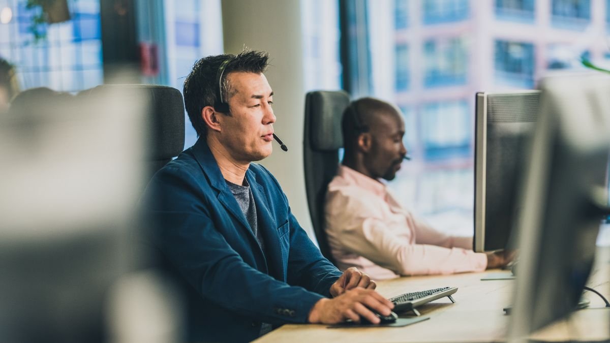 Customer support agent on the phone in a call center