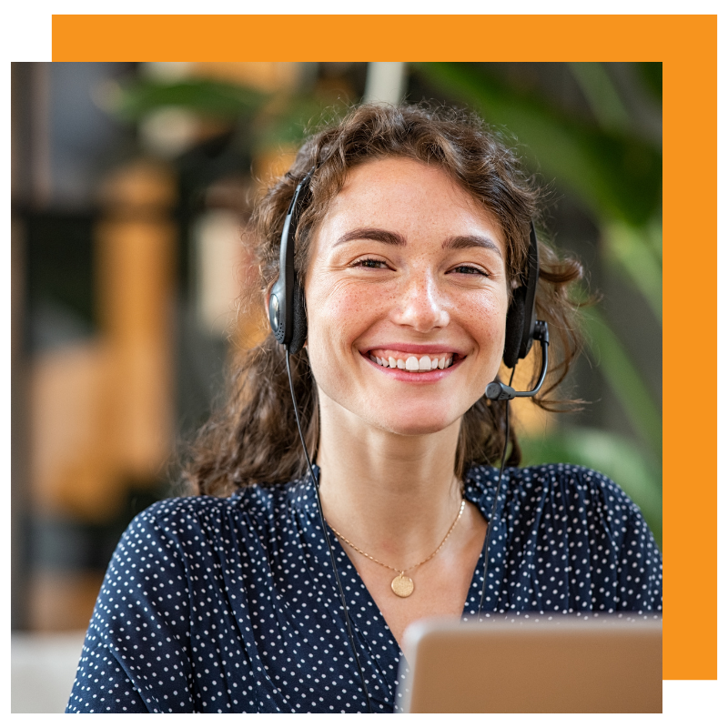 Smiling virtual receptionist wearing headset in call center